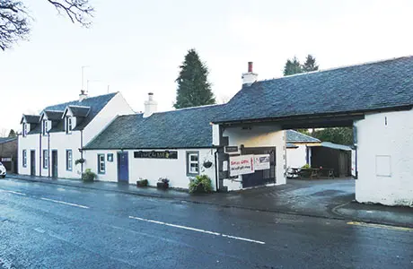 The Old Mill on Balfron Road as a local village pub